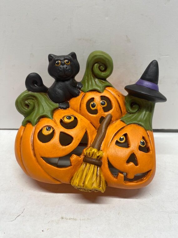 Handmade one of a kind ceramic Halloween Pump...