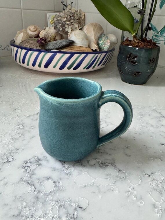 Small handmade, teal green pitcher, ceramic p...