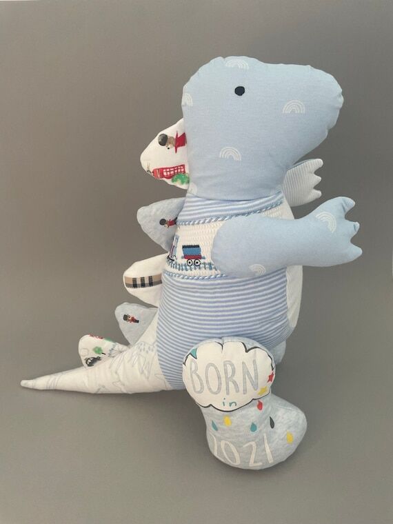 Memory keepsake dinosaur made from outgrown b...