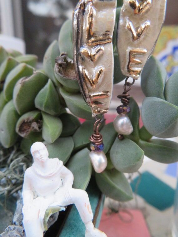 LOVE Creamy white ceramic earrings with 24K...