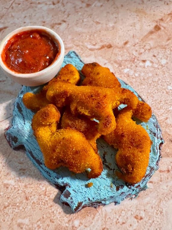 Miniature Dinosaur Chicken Nuggets with Ketch...