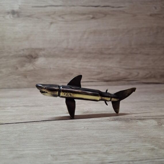 model shark brass Trench Art...