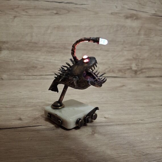bronze sculpture fish with lantern angler Han...