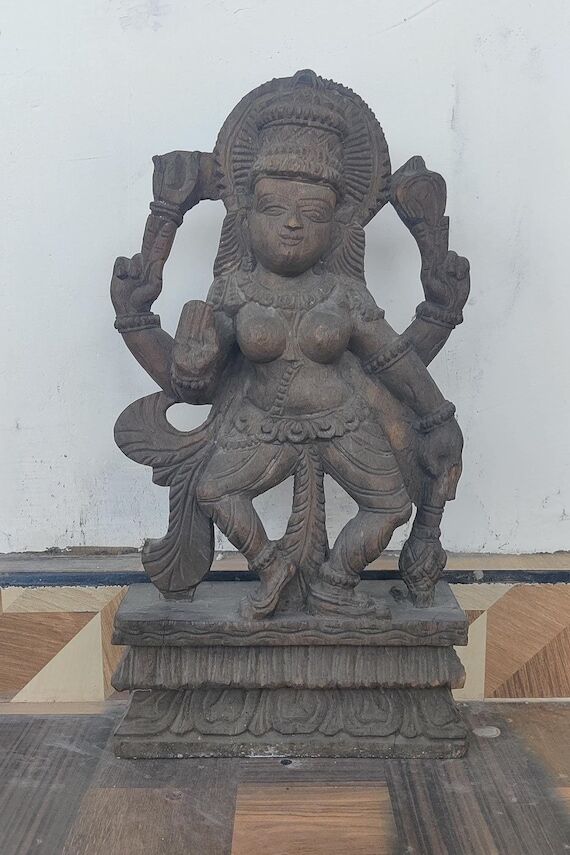 Vintage wooden statue of Indian goddess Devi ...