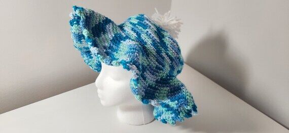 Handmade blue variegated ladies hat and ponch...