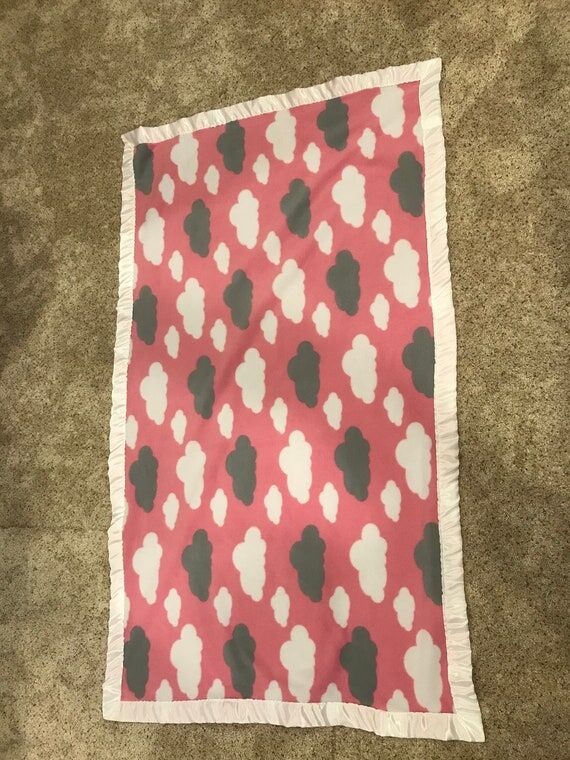 Handmade fleece blanket with silk edging in p...