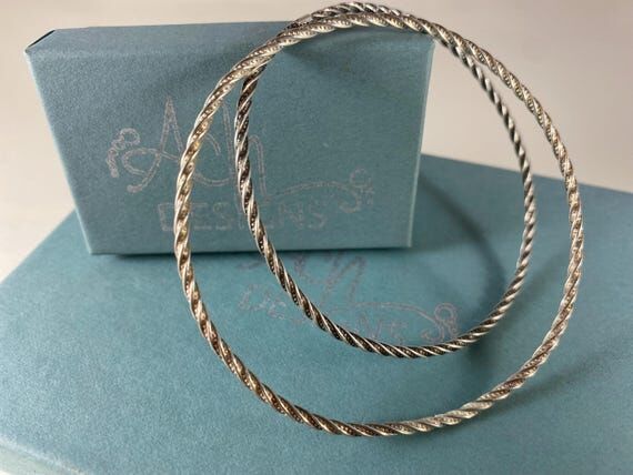 2x Twisted Sterling Silver Bangles (1 oxidize...