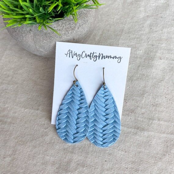 Light blue teardrop earrings, leather fishtai...