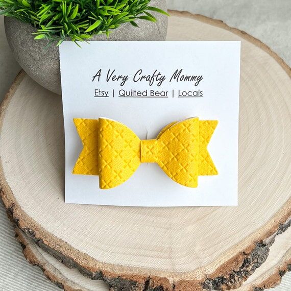 Bright Yellow Faux Leather Hair Bow: Crisscro...