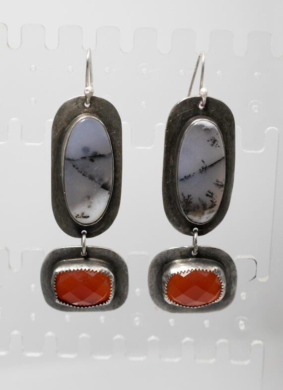 Sterling silver, dendritic opal and red facet...