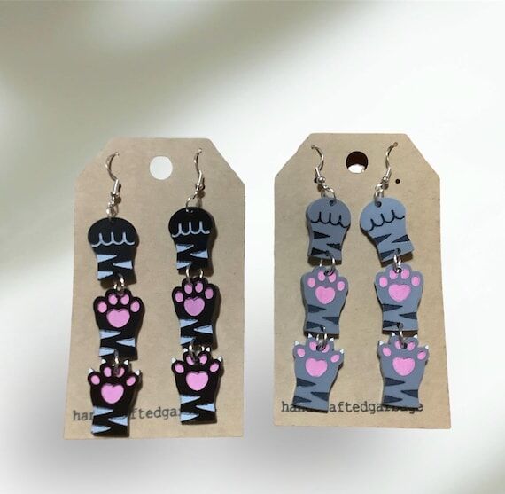 Cat paw acrylic dangle earring. Rock, paper, ...