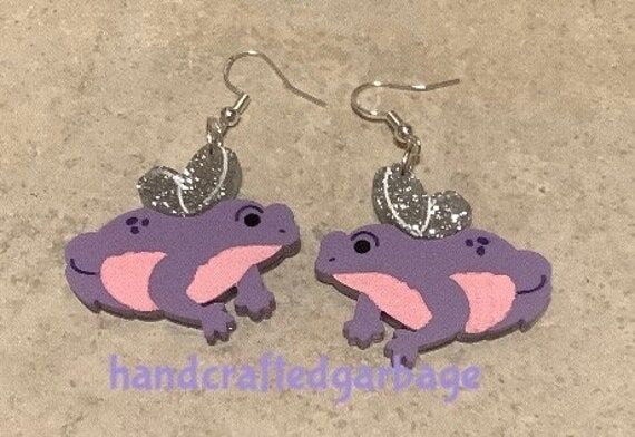 Fairy frog, winged frog dangle earring. Acryl...