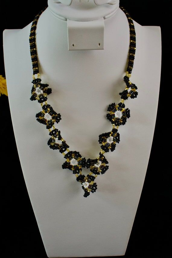 elegant handmade necklace with huichol beads...