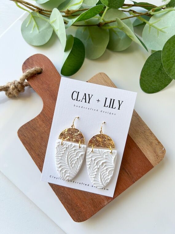 White Embossed Polymer Clay Dangle Earrings: ...
