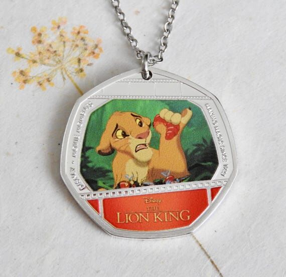 Lion King silver plated coin necklace/keychai...