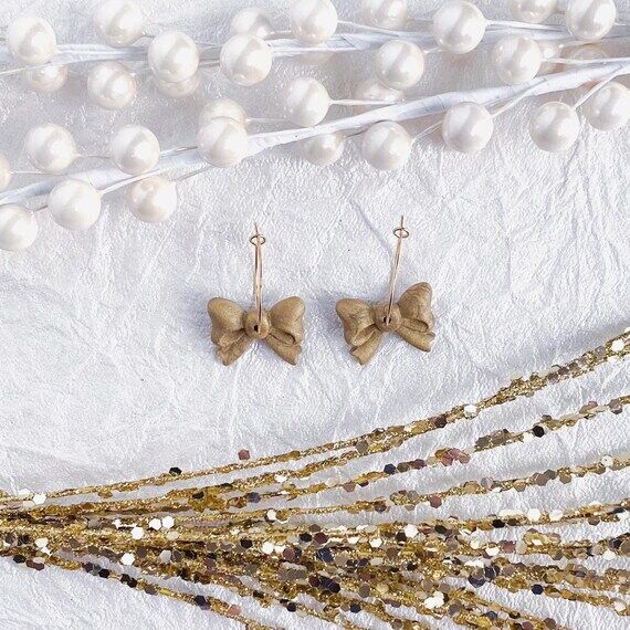 Gold Bow Dangles. Hoop earrings. Polymer clay...