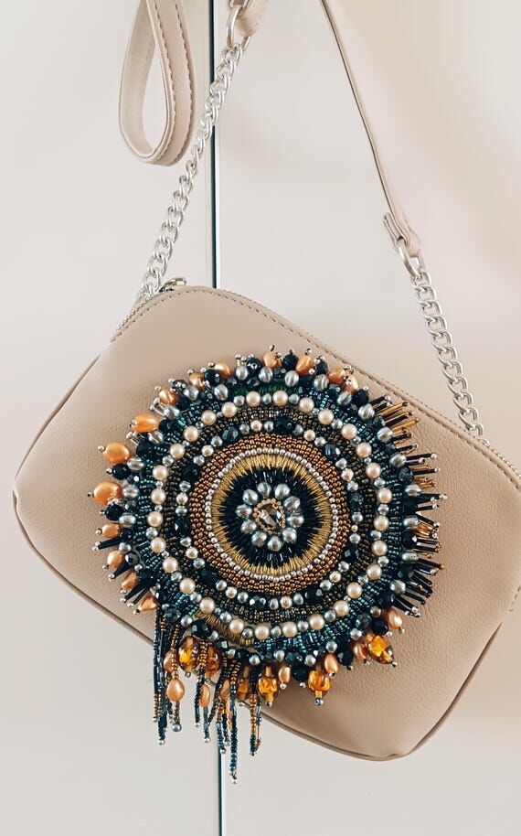 Hand-embroidered designer bag...