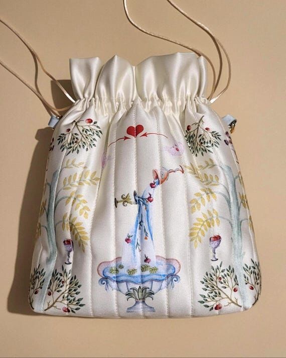 Satin bag with an original author's print...