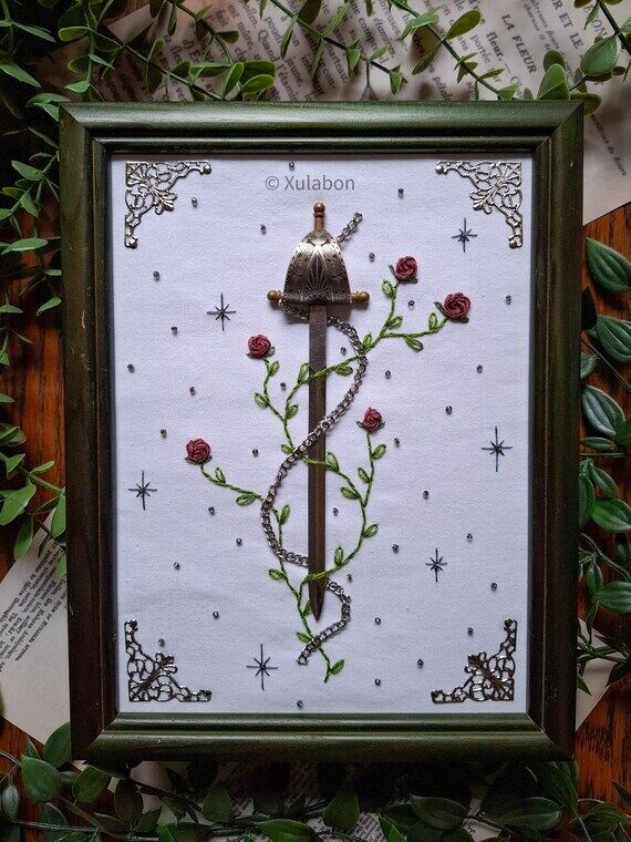 Wall decoration of a chained dagger and a fai...
