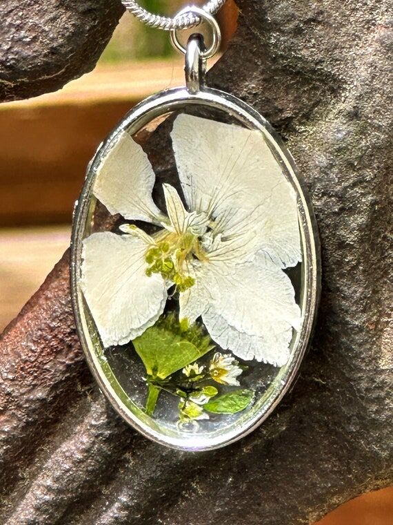 Handmade pressed flower pendant....