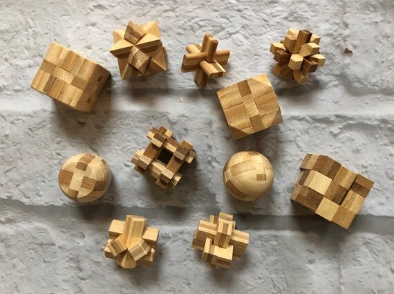 Handcrafted Wooden Burr Puzzles: Brain Teaser...