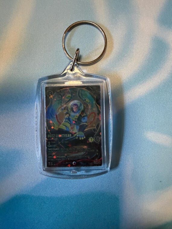 Lorcana Keychain - mini enchanted on both sid...