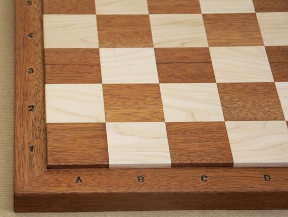Wood chess board with mahogany and maple , cu...
