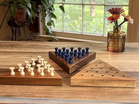 Triangle peg solitaire game, solid walnut, wo...