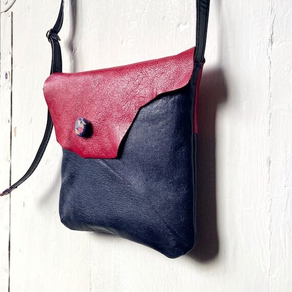 BLUEMONDAY is a handmade rectangular blue and...