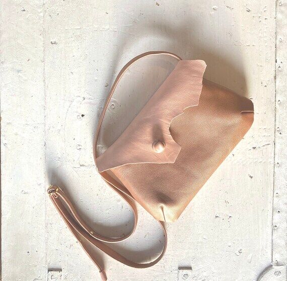 N5 is a handmade pink and rose gold leather s...