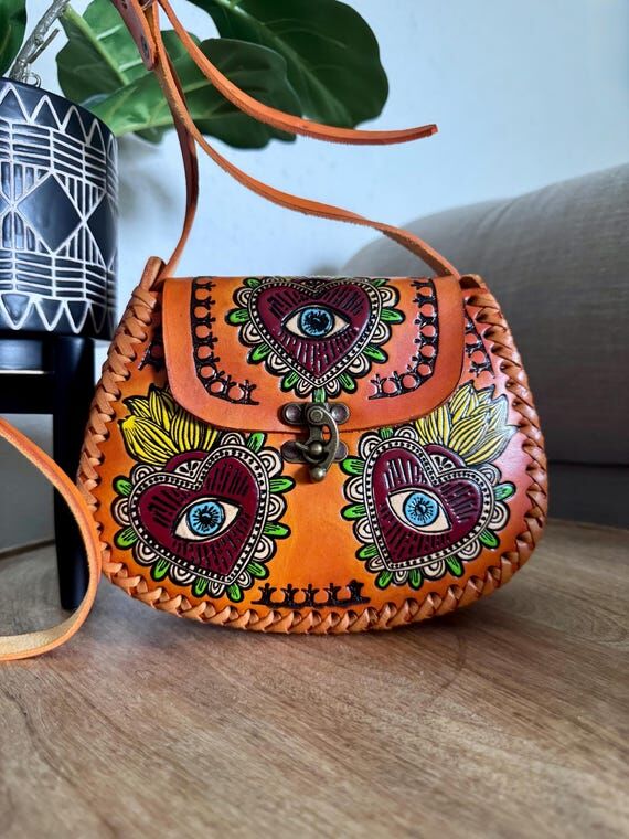 Hand-Tooled Embossed Leather Evil Eye and Sac...