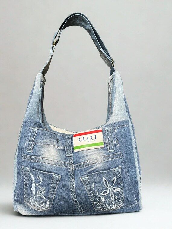 Unique handmade handbag made from recycled je...