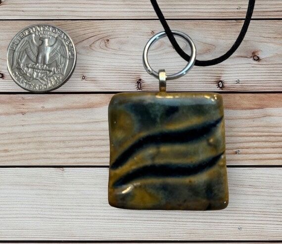 Whimsical blue clay and glass square necklace...
