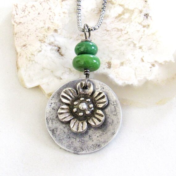 Silver Tone Flower Pendant with Green Serpent...