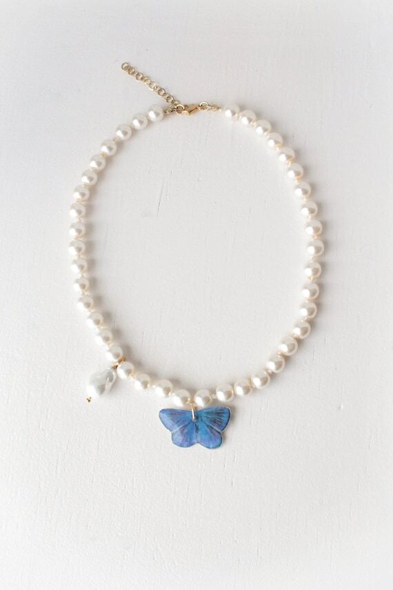Pearl Necklace with Navy Blue Butterfly Penda...