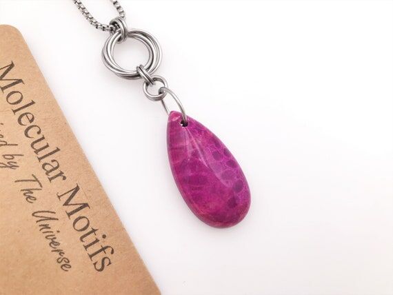 Pink Coral Fossil Pendant Necklace: Stainless...
