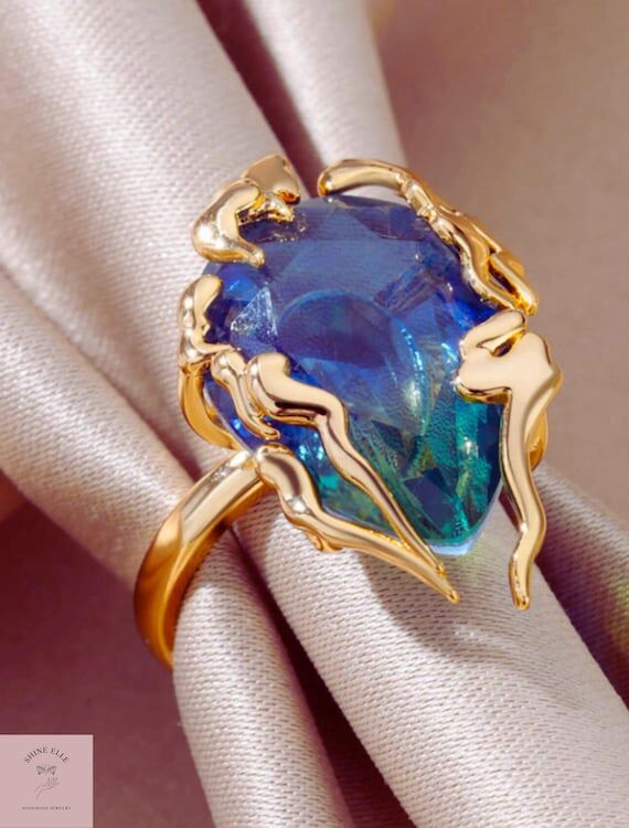Blue Topaz Flame Drop Ring: 18K Gold Plated A...