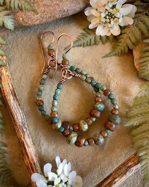 Beaded bohostyle hoop earrings. Earthy colore...