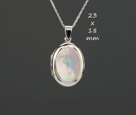 Mother of pearl sterling silver oval locket w...