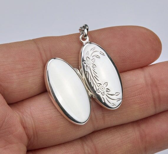 Sterling silver oblong oval locket with photo...