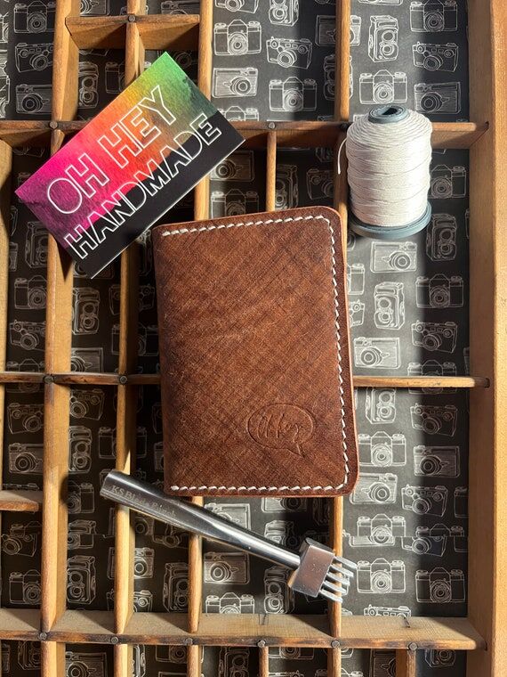 Handmade Leather Minimalist Bi-Fold Wallet...