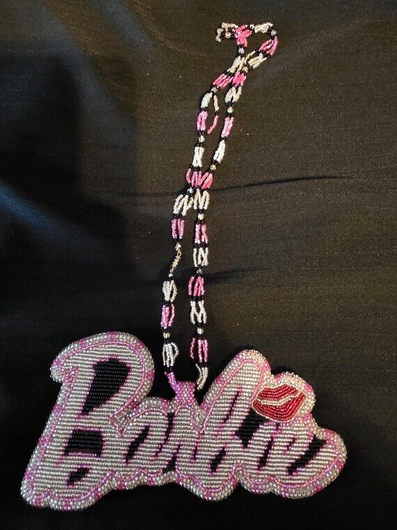 Barbie glass beaded medallion...