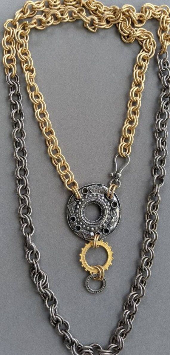 Mixed metals in a heavy double link chain wit...