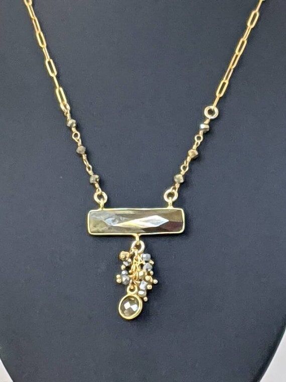 Faceted pyrite bar in vermeil with pyrite bea...