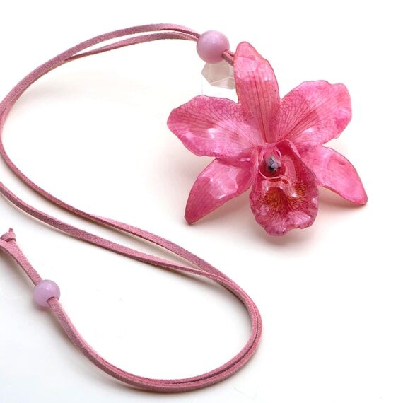 Necklace with a real Cattleya orchid and glas...