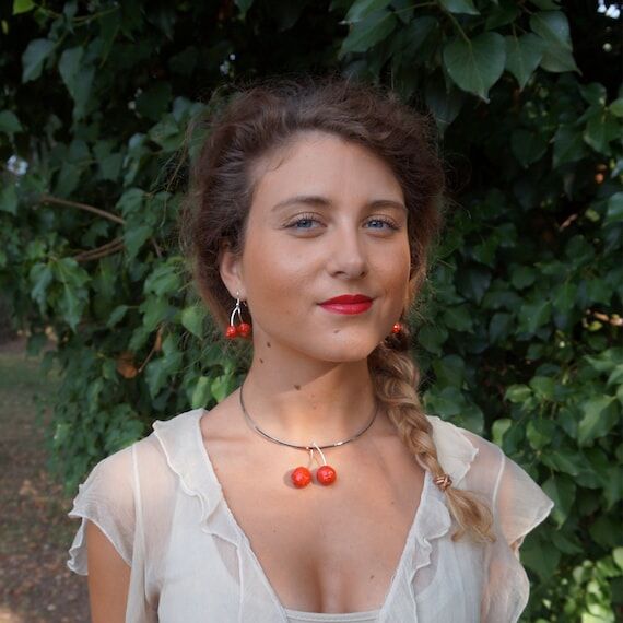 Long necklace with red and yellow papier mach...
