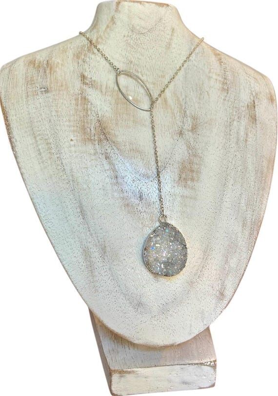 Sliced iridescent druzy geode teardrop lariat...