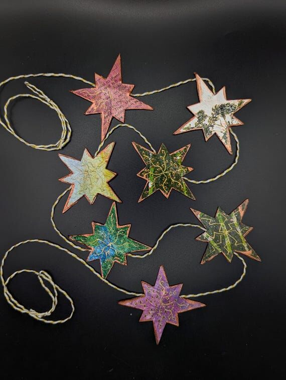 Handmade star garland: Seven stars attached ...
