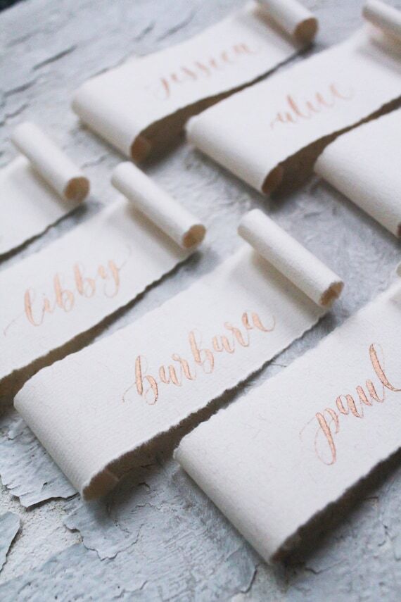 Blush and gold handmade paper scroll place ca...