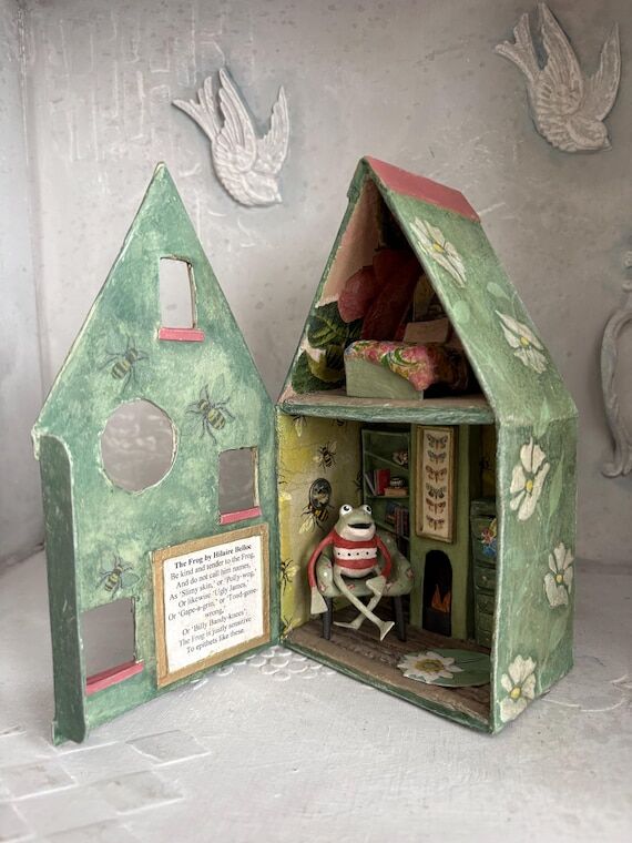 Paper mache frog in house...